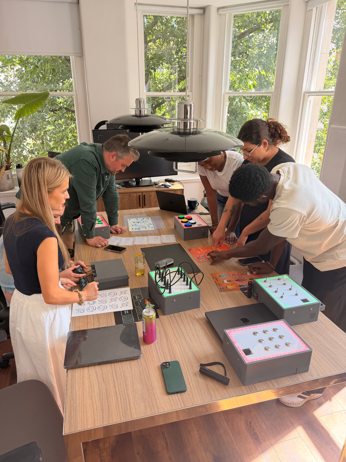 Team working through an UNPACK scenario around a boardroom table